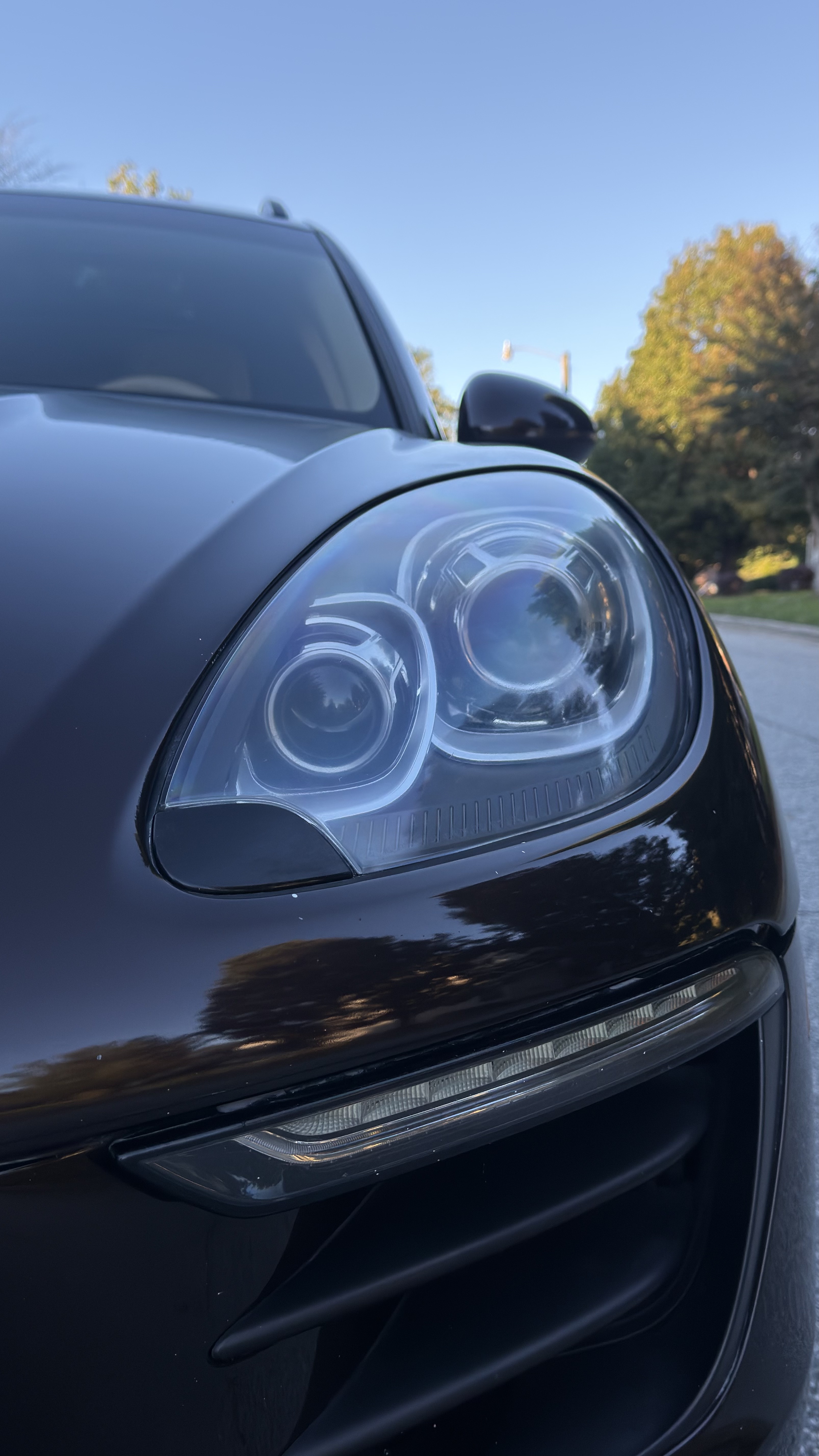 Same 2016 Porsche Macan headlight after restoration